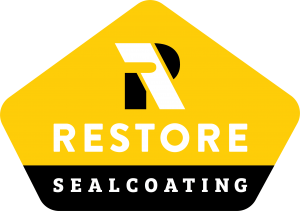yellow and black restore sealcoating logo for the sealcoating page e